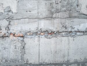 Concrete surface being inspected during a repair project